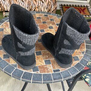 Black faux fur boots with gray knit backs